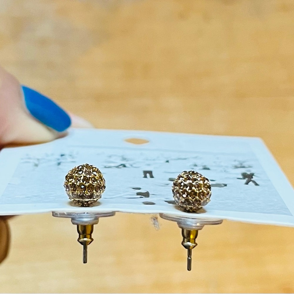 Anthropologie Circular hood stud earrings with chocolate crystals. New with tags